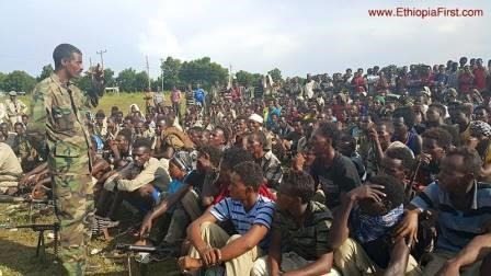 Photo - TPDM leader Mola Asgedom and fighters after fleeing Eritrea