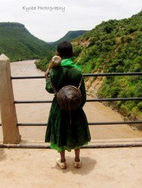 A little girl on Blue Nile bridge